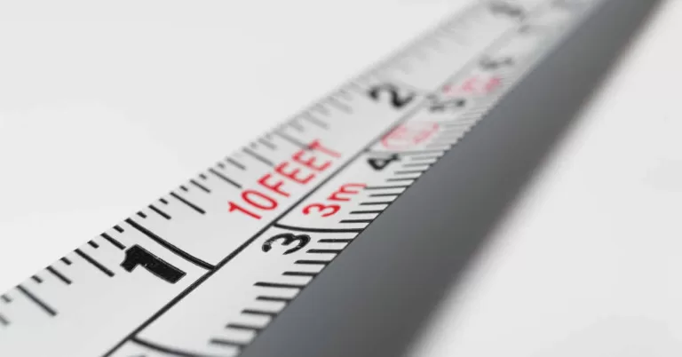 White 10 feet steel tape